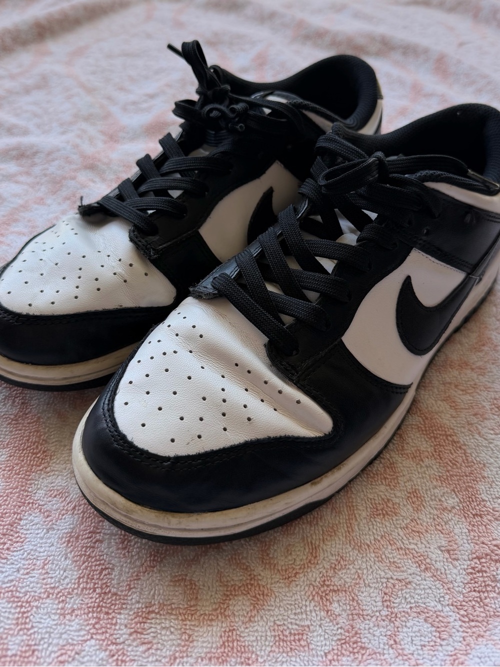 Nike Black and White dunk low top 
9.5 in women’s or 8 in men’s